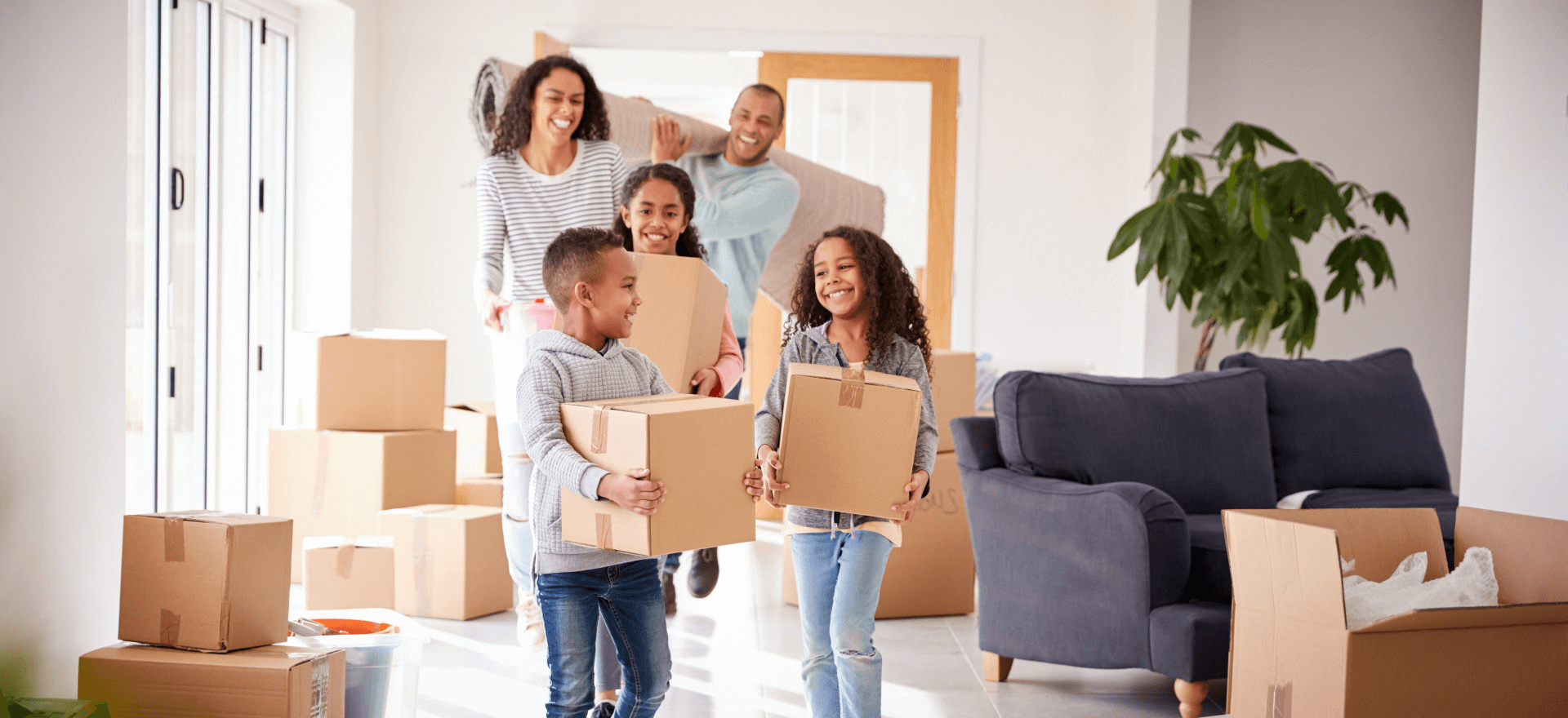 Happy family moving in to their new home thanks to NEXA Mortgage
